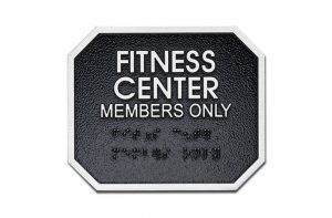 A safety sign at the fitness center for members only.