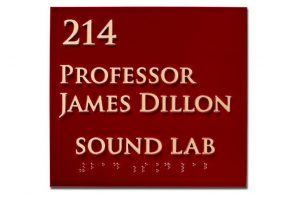 A sign that says Professor James Dillon Sound Lab, ADA-compliant.