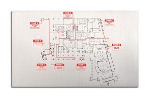 An image of a floor plan on a metal plate, perfect for safety.