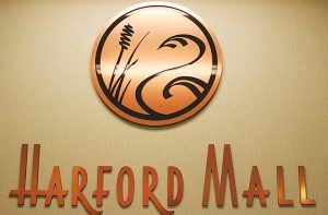The lobby logo for Harford Mall is displayed on the wall.