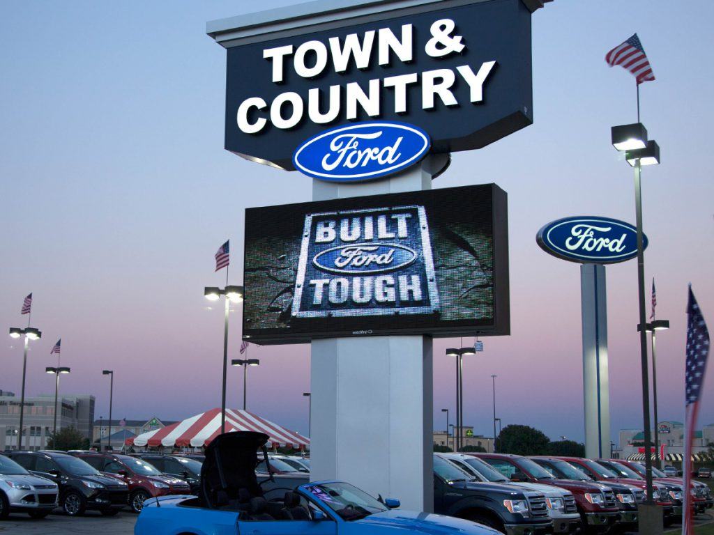 A large sign for town and country ford
