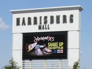 A large outdoor sign for the harrisburg mall.