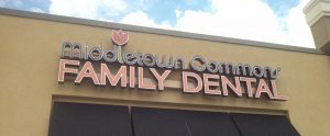 A sign that says middletown family dental.