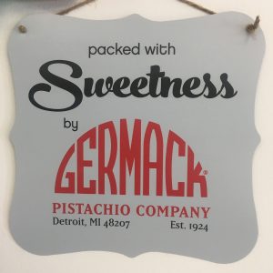 A sign that says packed with sweetness by germack.
