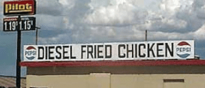 A sign for the fried chick restaurant on top of a building.